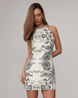 Robe longue beige drapée à col licou