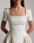 Miniabito bianco a pois stile vintage