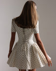 Miniabito bianco a pois stile vintage