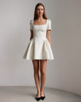Miniabito bianco a pois stile vintage
