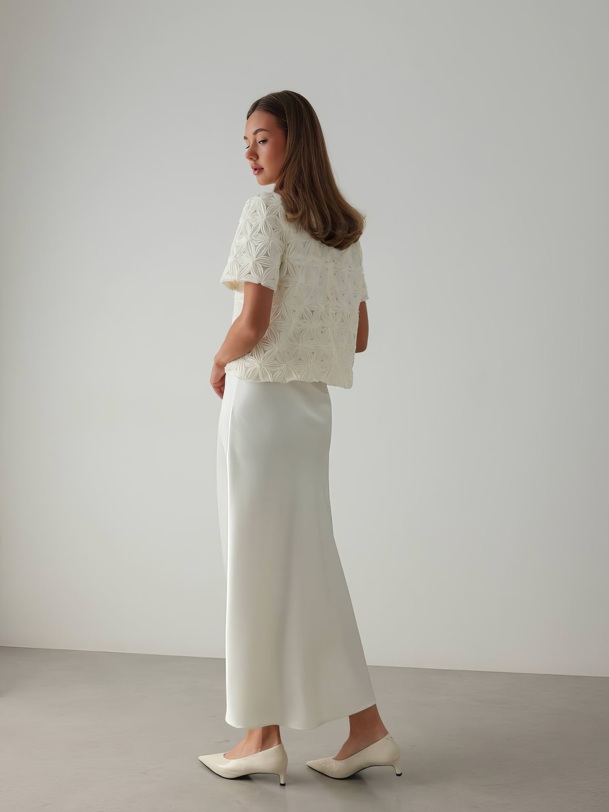 Blouse blanche texturée ornée à manches courtes