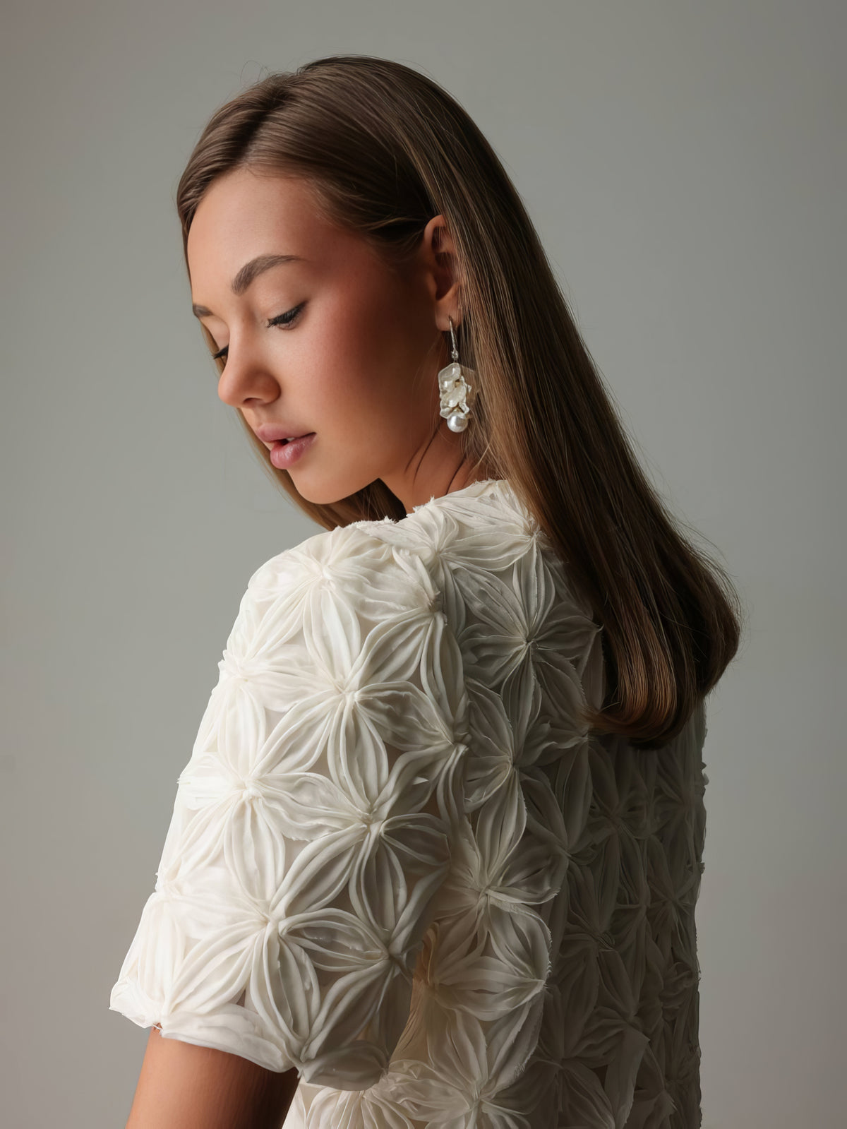 Blouse blanche texturée ornée à manches courtes