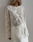 Blusa blanca con bordado de encaje