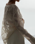 Blusa blanca con bordado de encaje