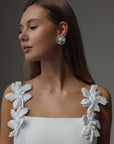 Vestido midi blanco con apliques florales