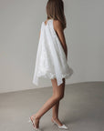 Mini-robe col licou ornée de sequins