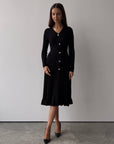 Robe midi noire en maille côtelée à boutons cristal