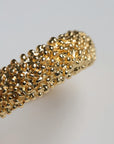 Brazalete rígido dorado texturizado
