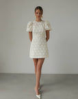 Vestido corto con textura Fleur