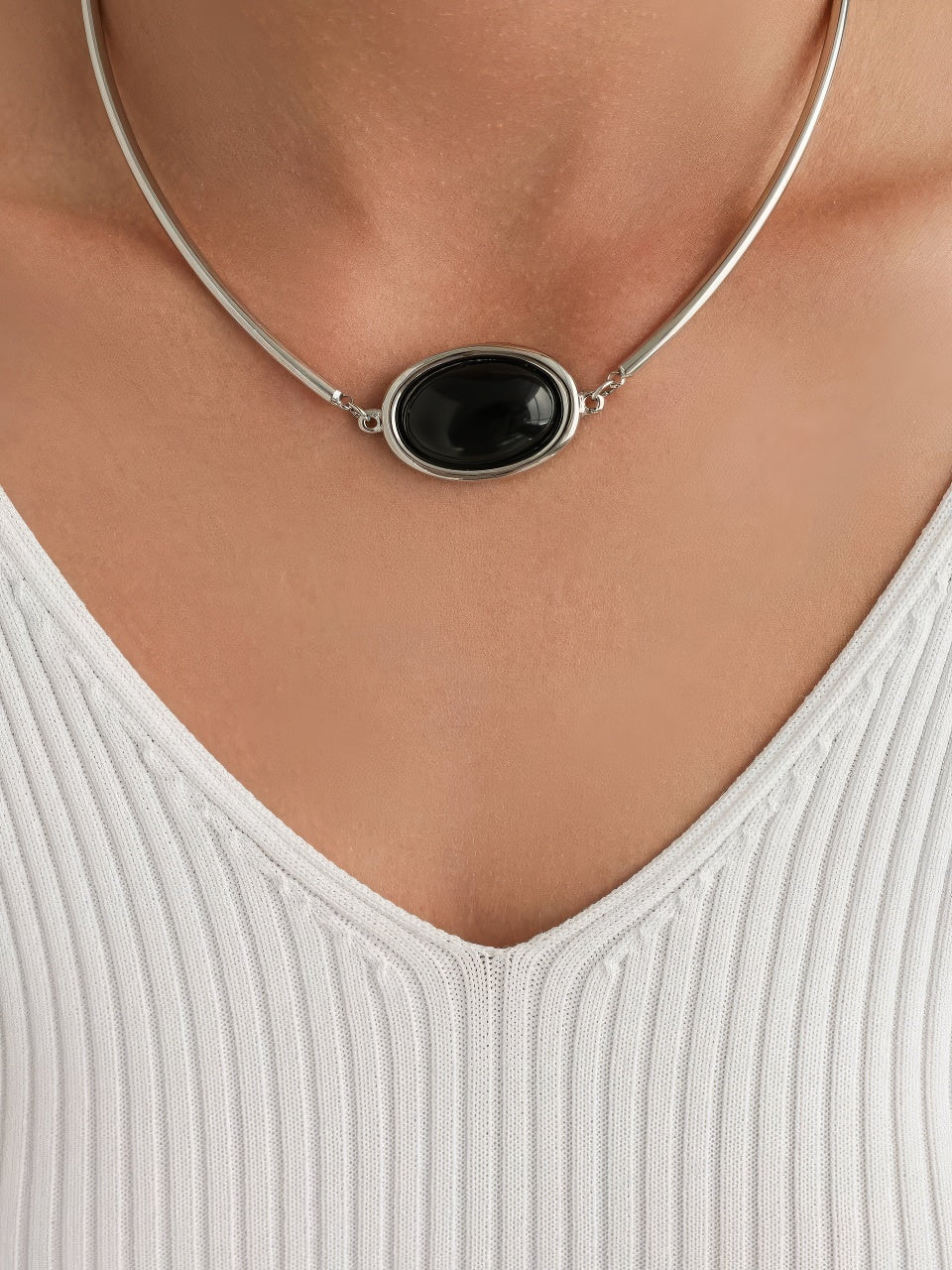 Top minimal in maglia a coste
