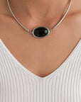 Top minimal in maglia a coste
