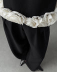 Pantalón negro elegante de pernera ancha
