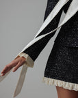 Conjunto negro de lentejuelas con encaje crema