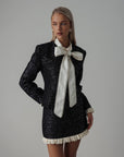 Conjunto negro de lentejuelas con encaje crema