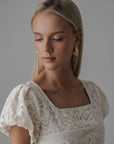 Completo top peplum e gonna in pizzo avorio